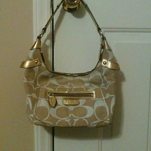 Tan, white, and gold Coach Purse