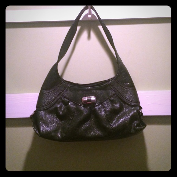 Dark green colored purse