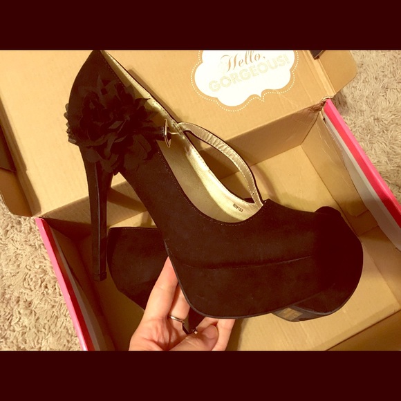 Tall strappy heels with flower detail