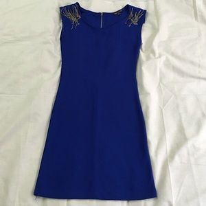 Royal blue mini dress with should embellishments