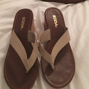 Tan soda wedges flip flops