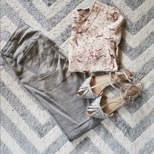 Semi-sheer light pink bird print blouse.