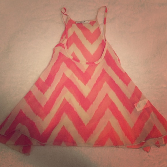 Sheer chiffon flowy coral & cream colored blouse.