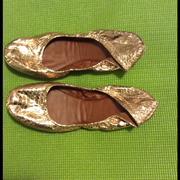 Lucky Brand metallic snake skin slip ons.