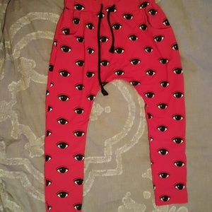 NWOT Red drop crotch eyeball pattern joggers