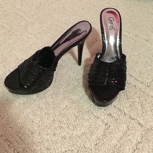 Carlos Santana black heels