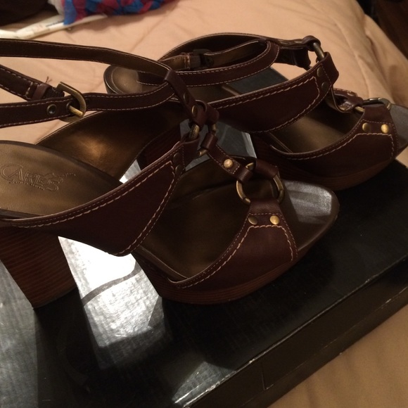 Sexy  high heel leather sandal with gold hardware.