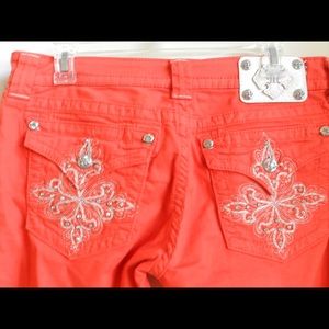 Orange Skinny Miss Me Jeans!