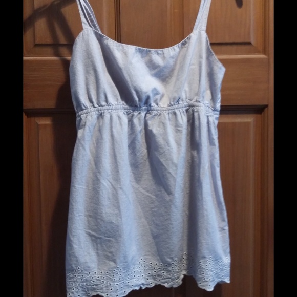 White and light blue striped top