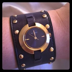 Dark purple leather band Nine West watch.