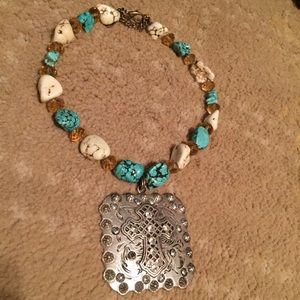 Western cross necklace.