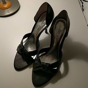 Open toe, high heel sandals.