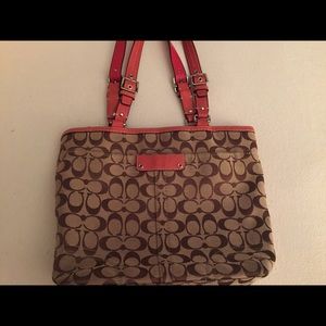 Coach bag. Tan Canvas with orange leather straps.