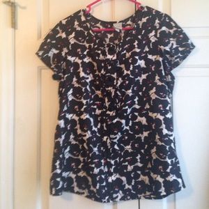 Cute top with black/ whit/ red flowers