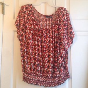 Orange and black top