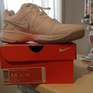 Nike women's city court white sneakers.