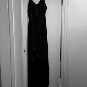 Black spaghetti strap dress.