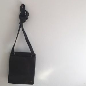 Persons brown leather cross body bag