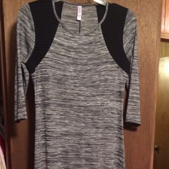 Grey maxi dress with black detailing on shoulders