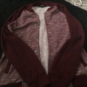Maroon varsity jacket