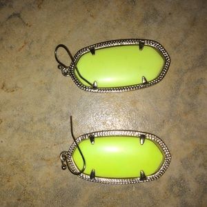 bright yellow Kendra scott earrings.