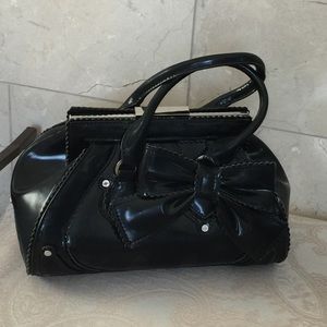 Black small bag with a bow