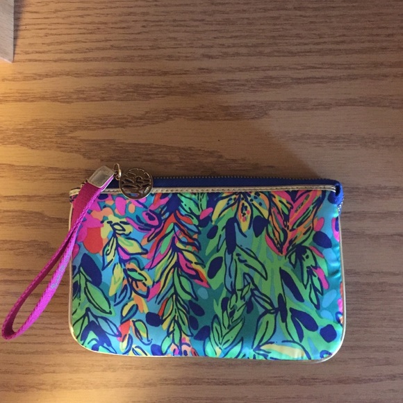 Lilly Pulitzer clutch in tropical storm
