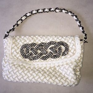 Beautiful white leather purse with chain design