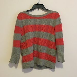 orange and tan sweater