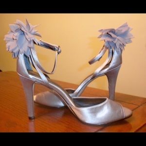 Calvin Klein stilettos with floral ankle accent