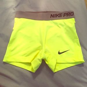Highlighter yellow Nike Pro shorts
