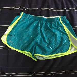 Under Armour lines running shorts