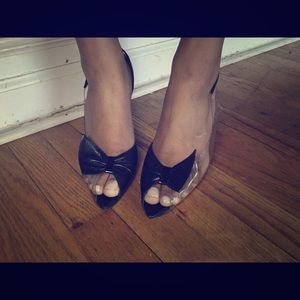 Black leather healed bow shoes