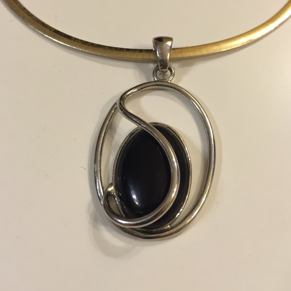 Silver and black pendant