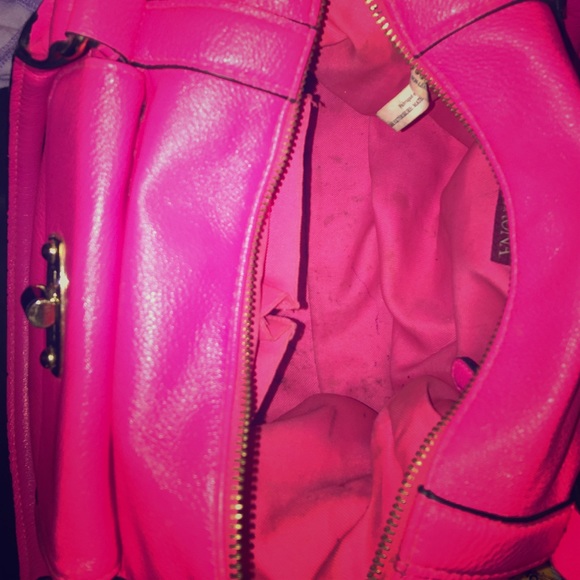 Inside has a zipper and pockets