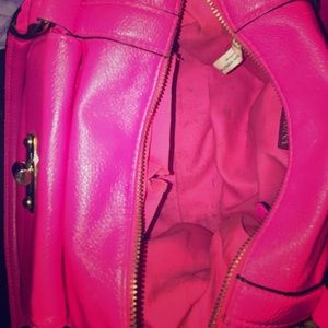 Inside has a zipper and pockets