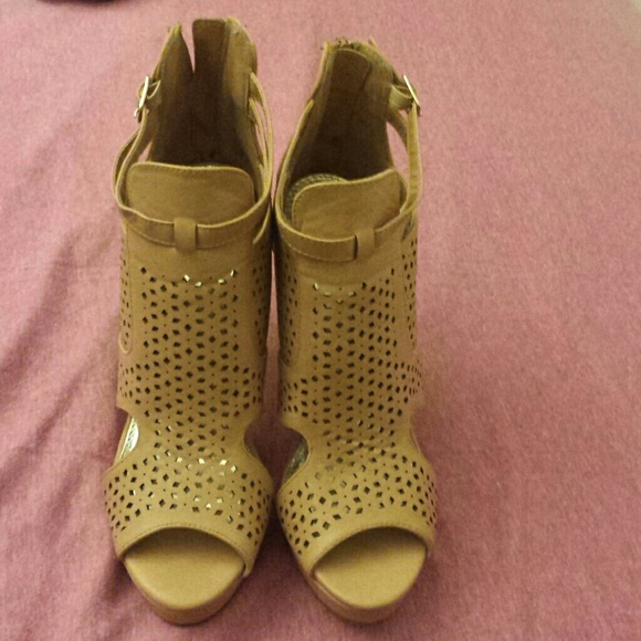 Tan peep toe caged high heels
