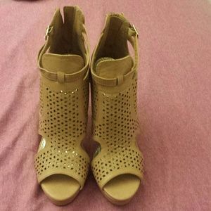 Tan peep toe caged high heels