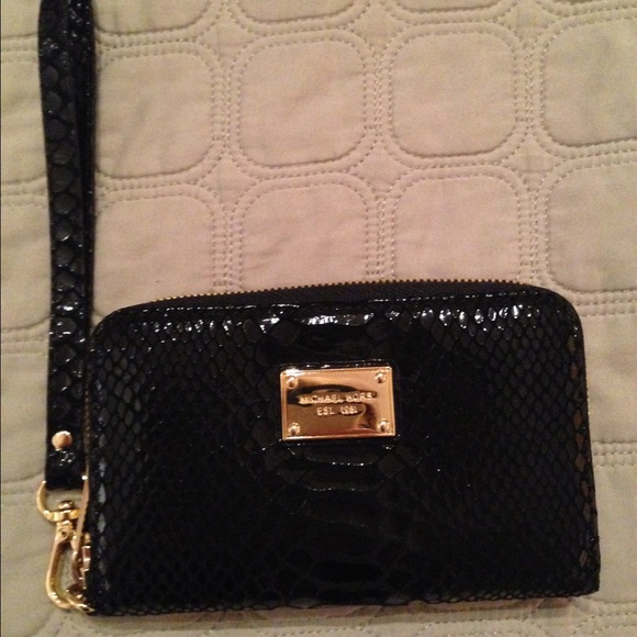 Michael Kors wristlet in excellent condition!
