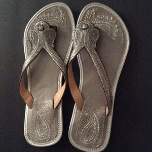 Sliver detailed slipper sandals.