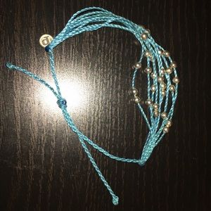 Pura Vida Platinum in neon blue