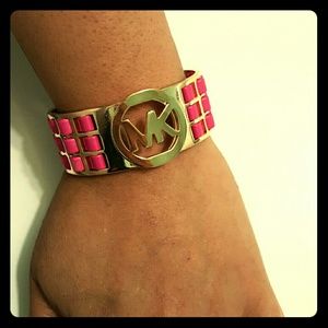 Woman's hand Michael Kors bracelet