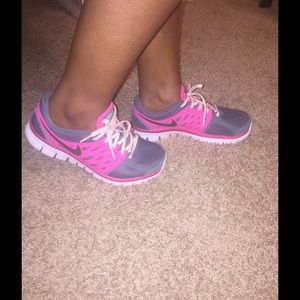 Grey and pink Nike gym shoes