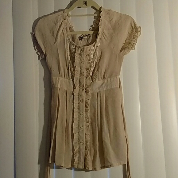 Nude colored, ruffled shirt