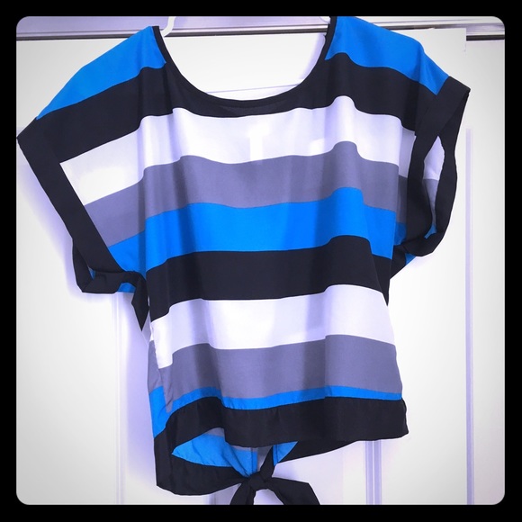 Fun and flirty blue, black and white top