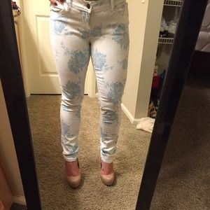 White and blue floral stretchy jeans size 10