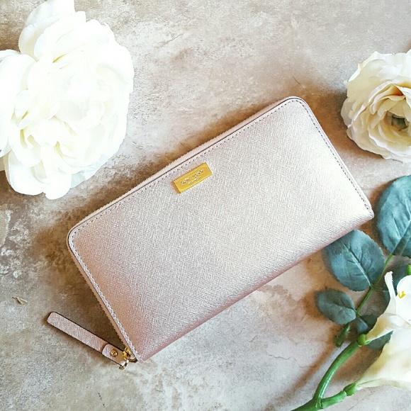 kate spade Handbags - Kate Spade Neda Newbury Lane Wallet Rose Gold