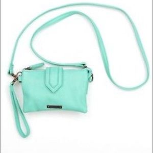 Rip curl clutch with optional strap