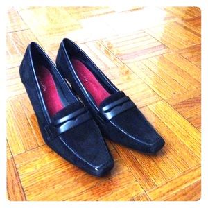 Aerosol classic black suede one inch heel.