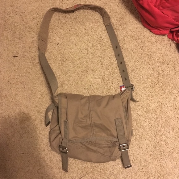 Tan cross body bag